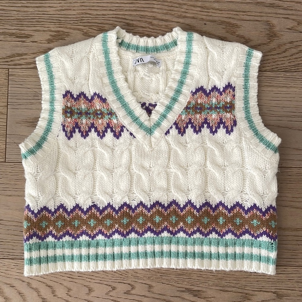Zara sweater vest. White with mint trim, and purple and pink design